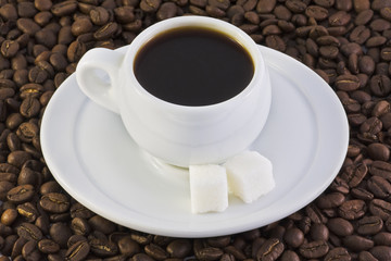 coffee beans and a cup of coffee