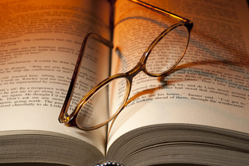Glasses on book