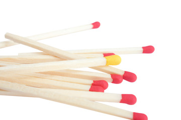 Bunch of red matches and one yellow isolated
