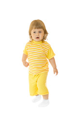 Small girl in yellow shirt and pants