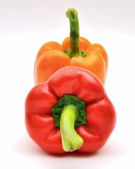 Red and orange capsicum — upright and face