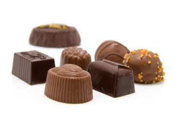 Chocolate bonbons on white background