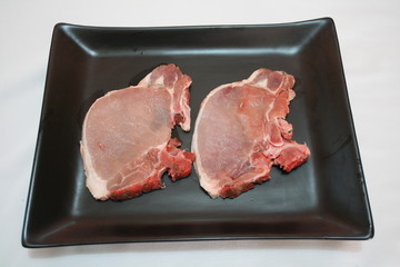 Chuletas de cerdo frescas.