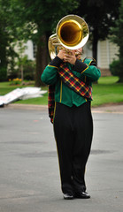 Performer Playing Marching Tuba in Parade