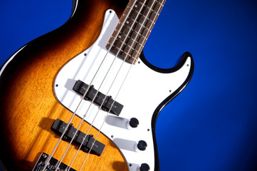 Bass Guitar Isolated on Blue