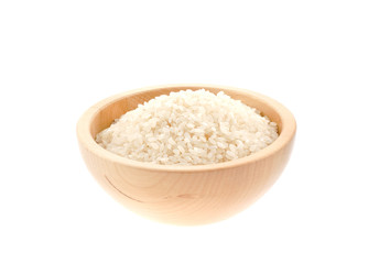 rice seeds in a wood bowl