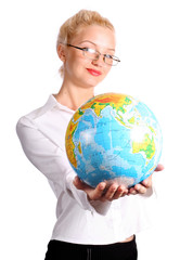 young blond woman holding a globe