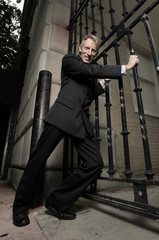 Businessman opening the gates