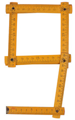 old yellow ruler forming font symbol 9