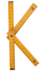 old yellow ruler forming font symbol K