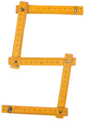 old yellow ruler forming font symbol S