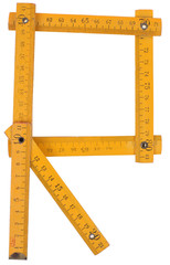 old yellow ruler forming font symbol R