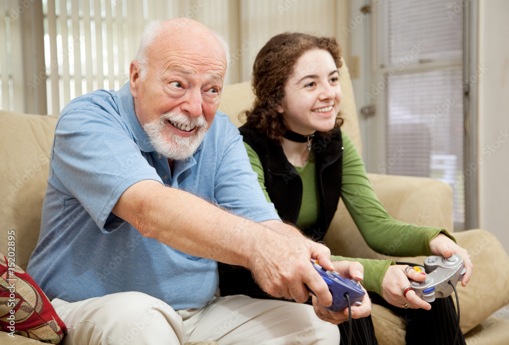 Wall mural senior man playing video games