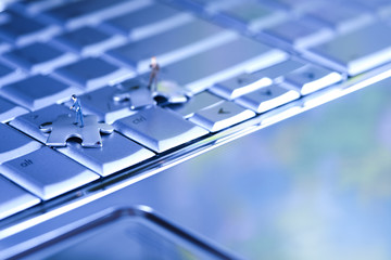 Figure man over computer background