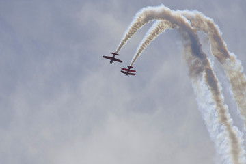 Two planes performing in an air show