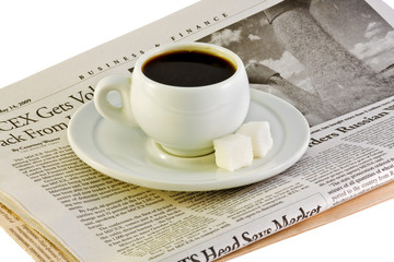 cup of coffee in the newspapers