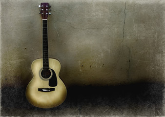 Spanish guitar on old wall, copy spaced.Grunge image.