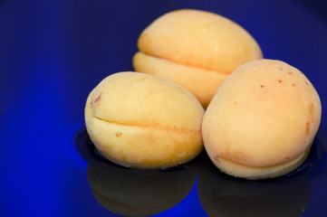 Apricot on blue water