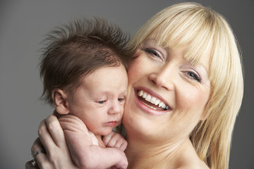 Mother Holding Newborn Baby