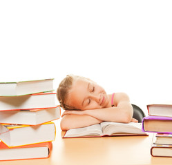 Little schoolgirl fall asleep after reading a book