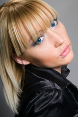 portrait of a beautiful blond-haired, blue-eyed model