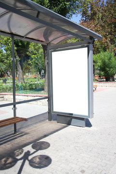 Black banner on a bus shelter.