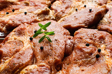 Fresh raw steaks ready to grill