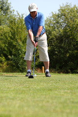 Obraz premium golfer beim abschlag