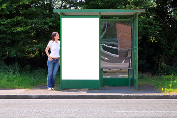 Woman at a bus stop blank billboard