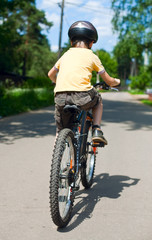 Kid riding bicycle