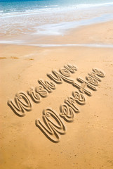 Wish you were here, written in the sand