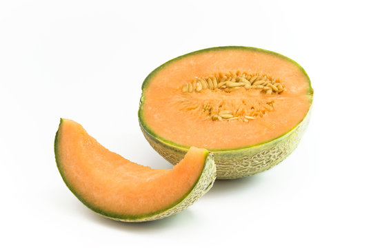 Melone halbiert und Stück