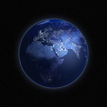 Night view of Earth with lights glowing in urban areas.