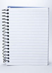 Notepad with spiral binding and white, lined pages.