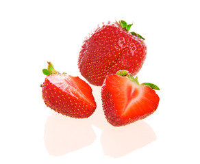 Strawberries over white background
