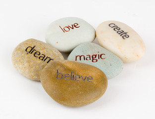 Obraz na płótnie Canvas Create, magic, believe, dream, and love stones