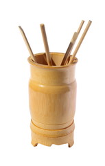 Wooden bamboo glass with the chopsticks . (isolated)