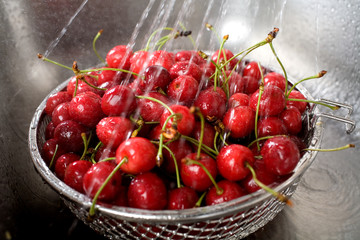 wet fresh cherry in sink