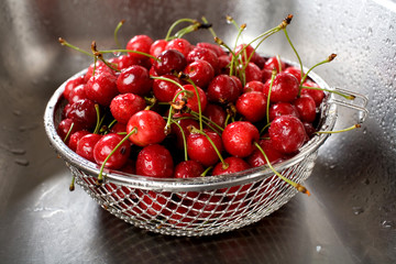 wet fresh cherry in sink