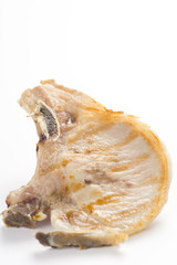 tasty pork chop with corn carrot tomato