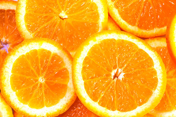 Sliced oranges background