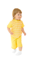 Small girl in yellow shirt and pants
