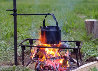 Campfire and teapot.
