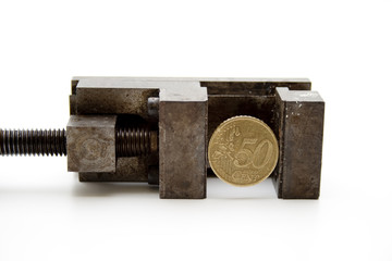 Geld im Schraubstock