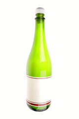 Green glass bottle with blank label isolated on white background