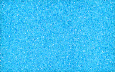 blue background, texture of foam rubber