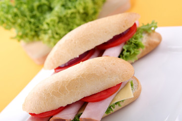 Sandwich with fresh vegetables, ham and cheese