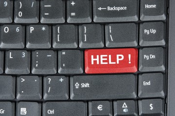 Gray keyboard with HELP word on the red button