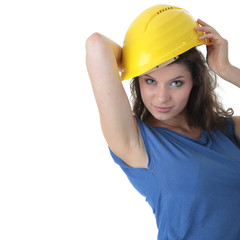 Sexy young woman construction worker contractor
