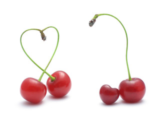 Two happy cherries and one with heart